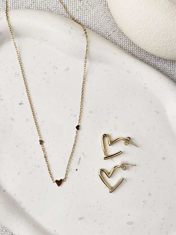 Edelstahlkette Tres Herzen gold